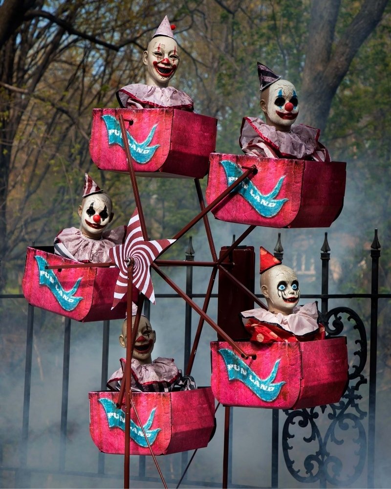 Animated evil clown Ferris wheel Halloween decoration with creepy carnival theme