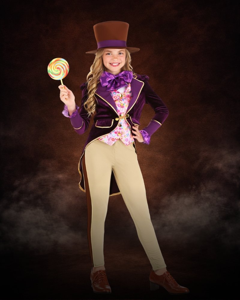 Candy Inventor costume for girls with purple velvet jacket, candy-print vest, top hat, and whimsical styling