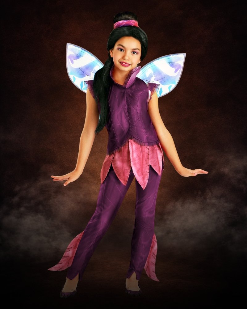Girl wearing a premium Disney-inspired fairy Halloween costume with wings and green fantasy details