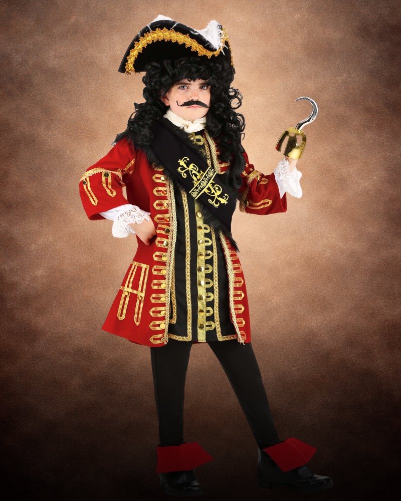 Boy wearing a premium captain pirate Halloween costume with red coat, gold trim, and feathered pirate hat
