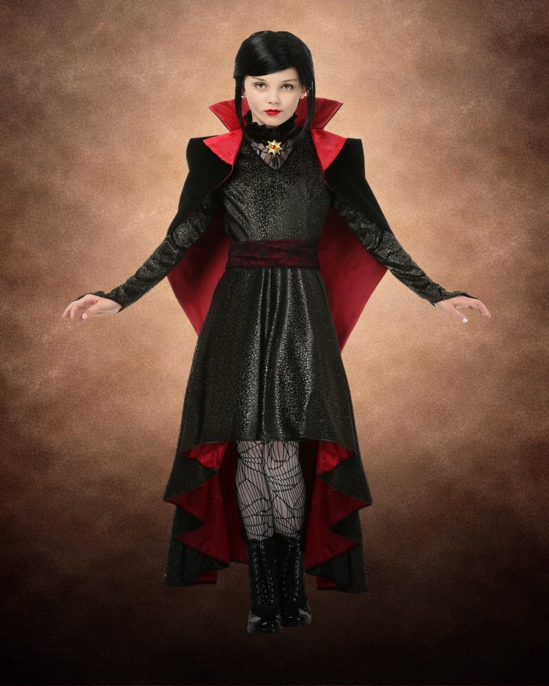 Premium vampire costume for girls with gothic black dress, satin red cape, spiderweb tights, and elegant Halloween styling