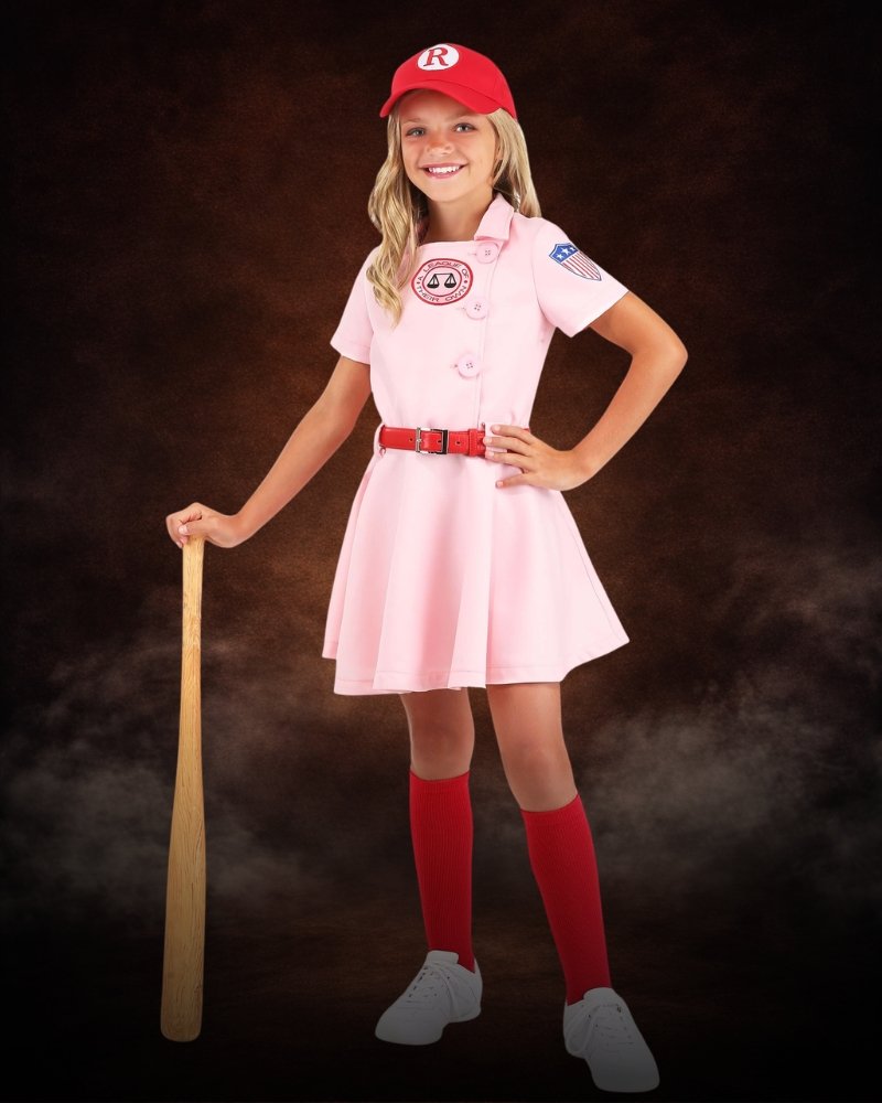 A League of Their Own girls baseball costume with pink dress, red cap, knee socks, and vintage-inspired styling