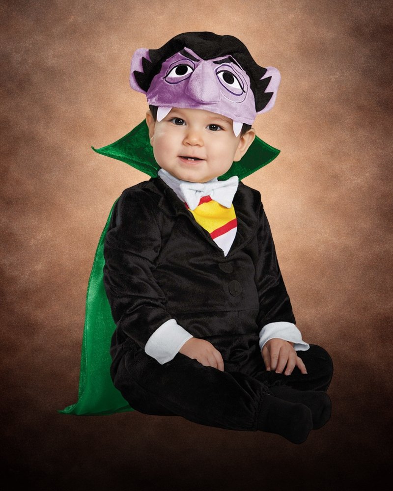 Infant wearing a premium Sesame Street Count Halloween costume with black suit, green cape, and character headpiece