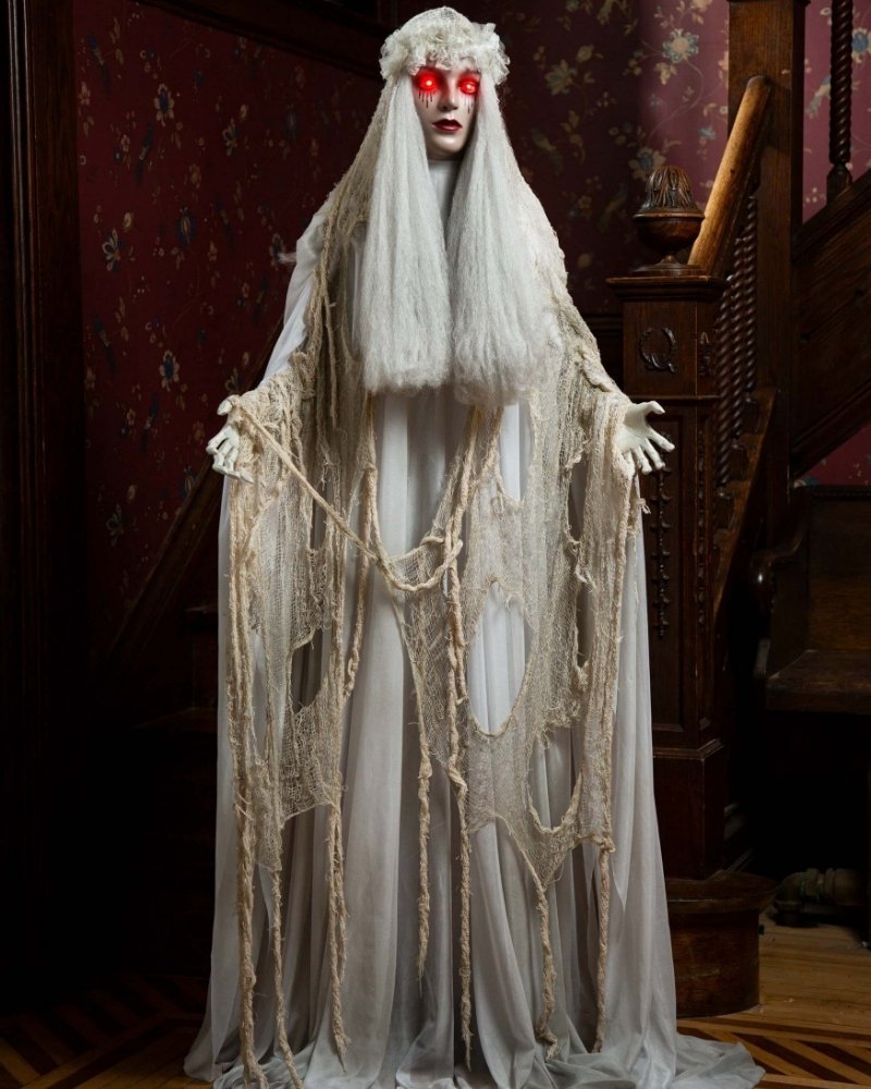 Venetian Victoria standing ghost girl Halloween decoration with glowing red eyes