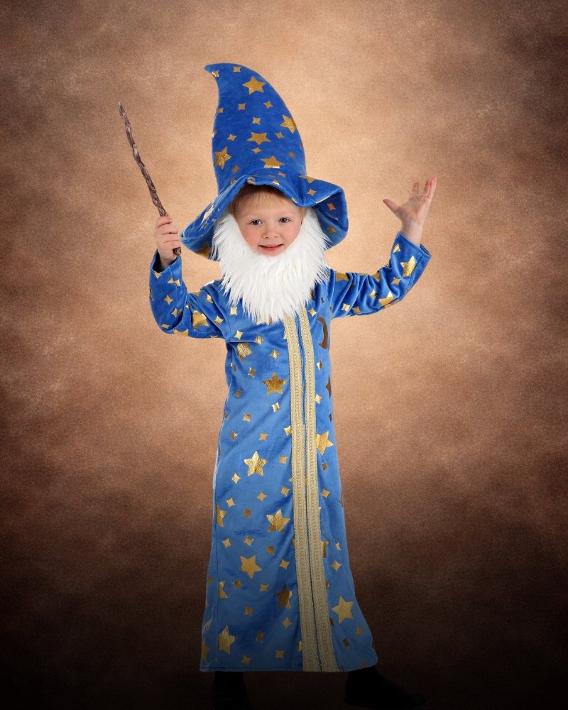 Toddler wearing a premium blue wizard Halloween costume with gold stars, moons, and matching pointed hat