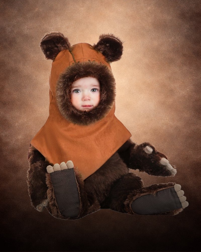 Deluxe Infant Star Wars Ewok costume with furry hood, plush ears, faux fur suit, mitts, and paw-style foot covers