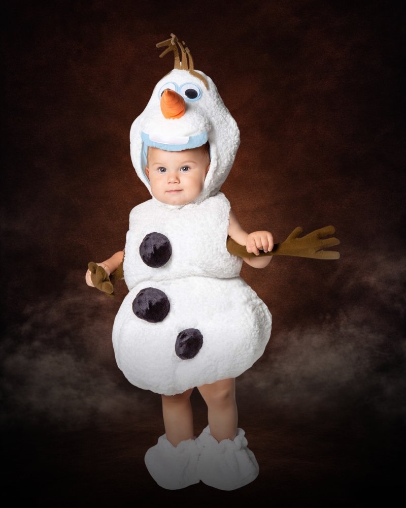 Infant Premium Disney Frozen Olaf costume with white plush snowman tunic, carrot nose headpiece, coal buttons, and boot covers