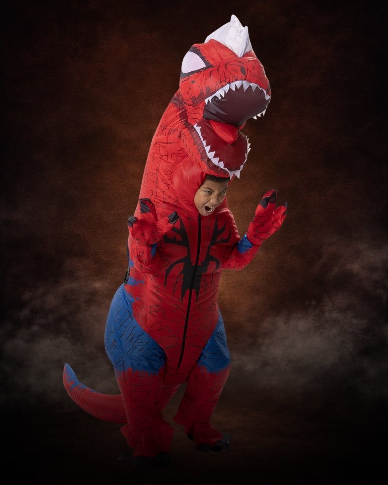 Inflatable Spider-Rex Costume for Kids featuring red and blue Spider-Man graphics, oversized dinosaur head, claws, and inflatable tail.