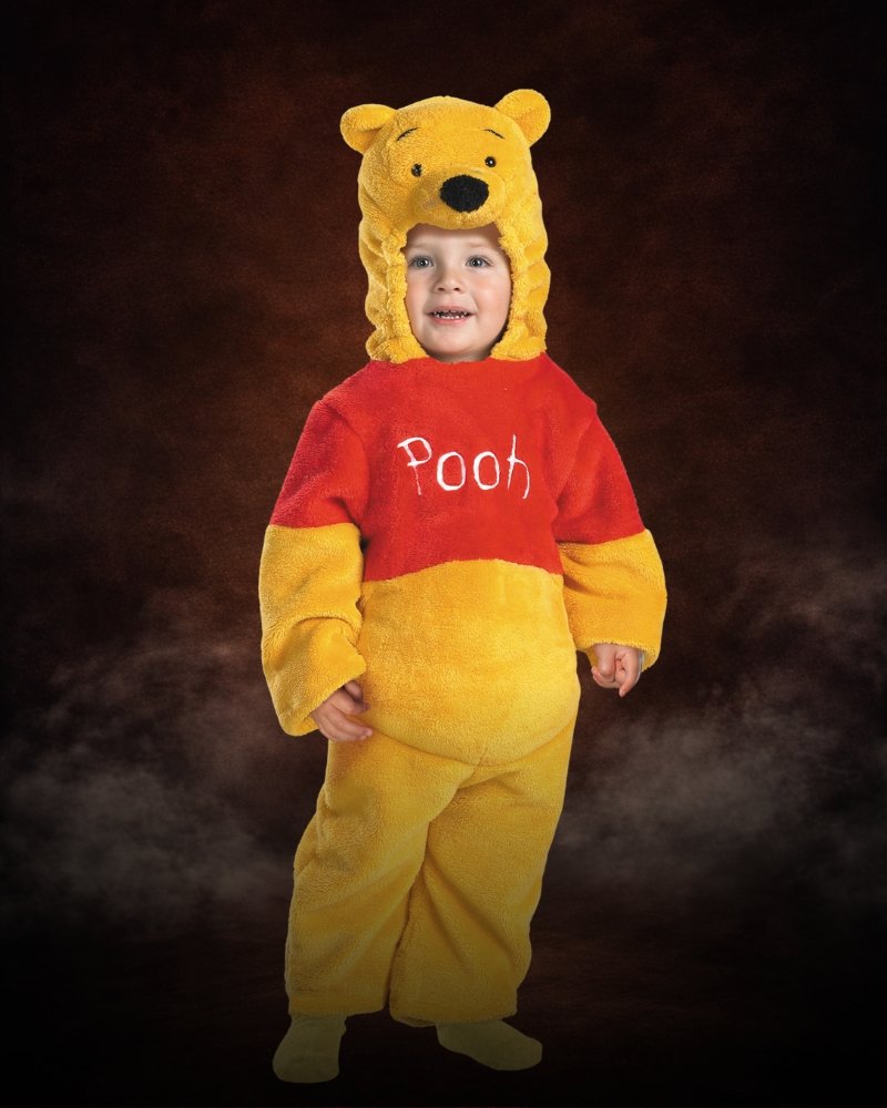 Toddler Deluxe Winnie the Pooh costume for toddlers with yellow faux fur jumpsuit, embroidered red shirt, and character hood