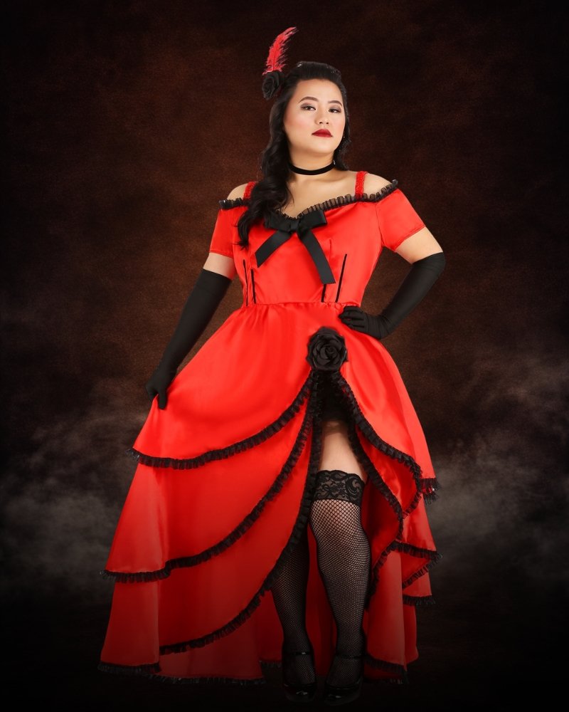 Women's Plus Size Sassy Showgirl Costume with scarlet tiered dress, black organza trim, thigh-high slit, ribbon choker and feather rose hair clip