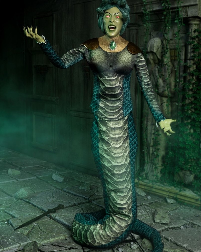 Monstrous Medusa Halloween animatronic with snake hair, glowing red eyes, scaled armor and serpent tail